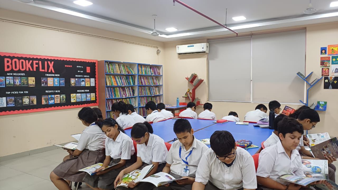 Turning Pages with Play: Musical Chairs in the Library!